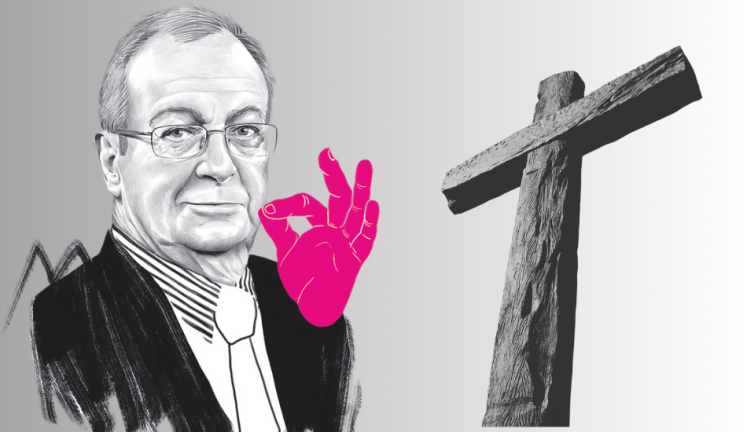 Frank A. Meyer und ein christliche Holzkreuz.