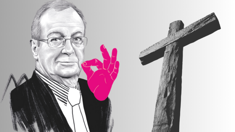 Frank A. Meyer und ein christliche Holzkreuz.
