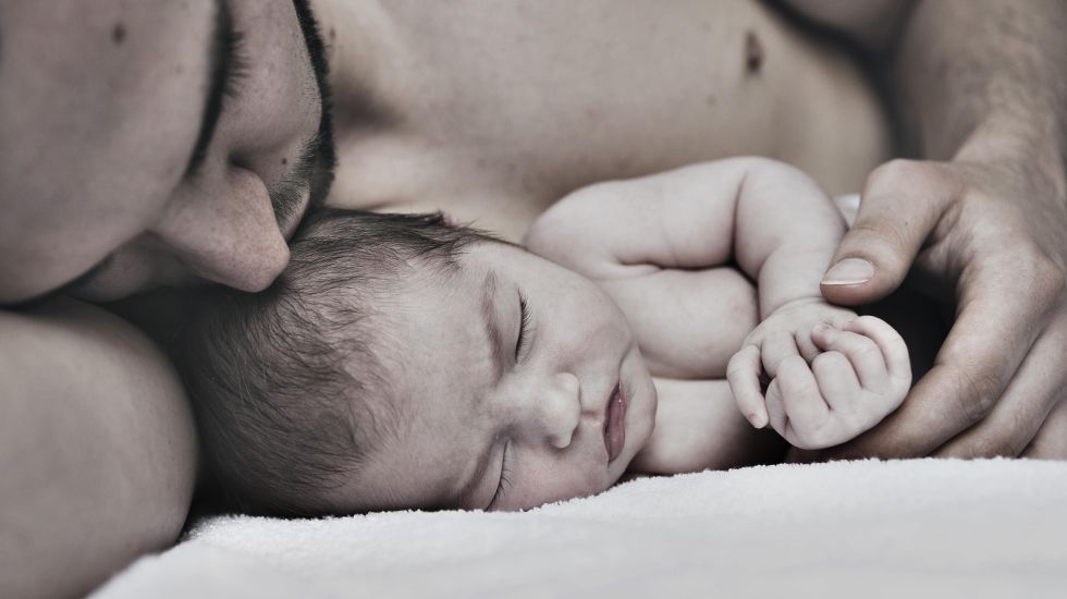 Vater mit Baby